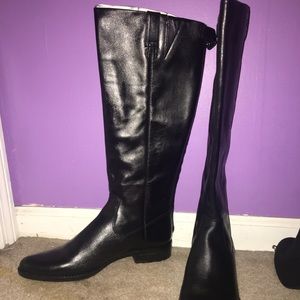 Black Calvin Klein leather boots
